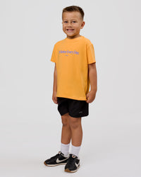 Studio image of VS6 1% Better Kids FLXCotton Tee - Warm Apricot | Thumbnail Index: 3