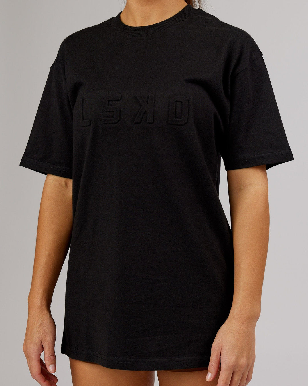 Woman wearing Unisex Stamped 2.0 Heavyweight Tee Oversize - Black - view 10