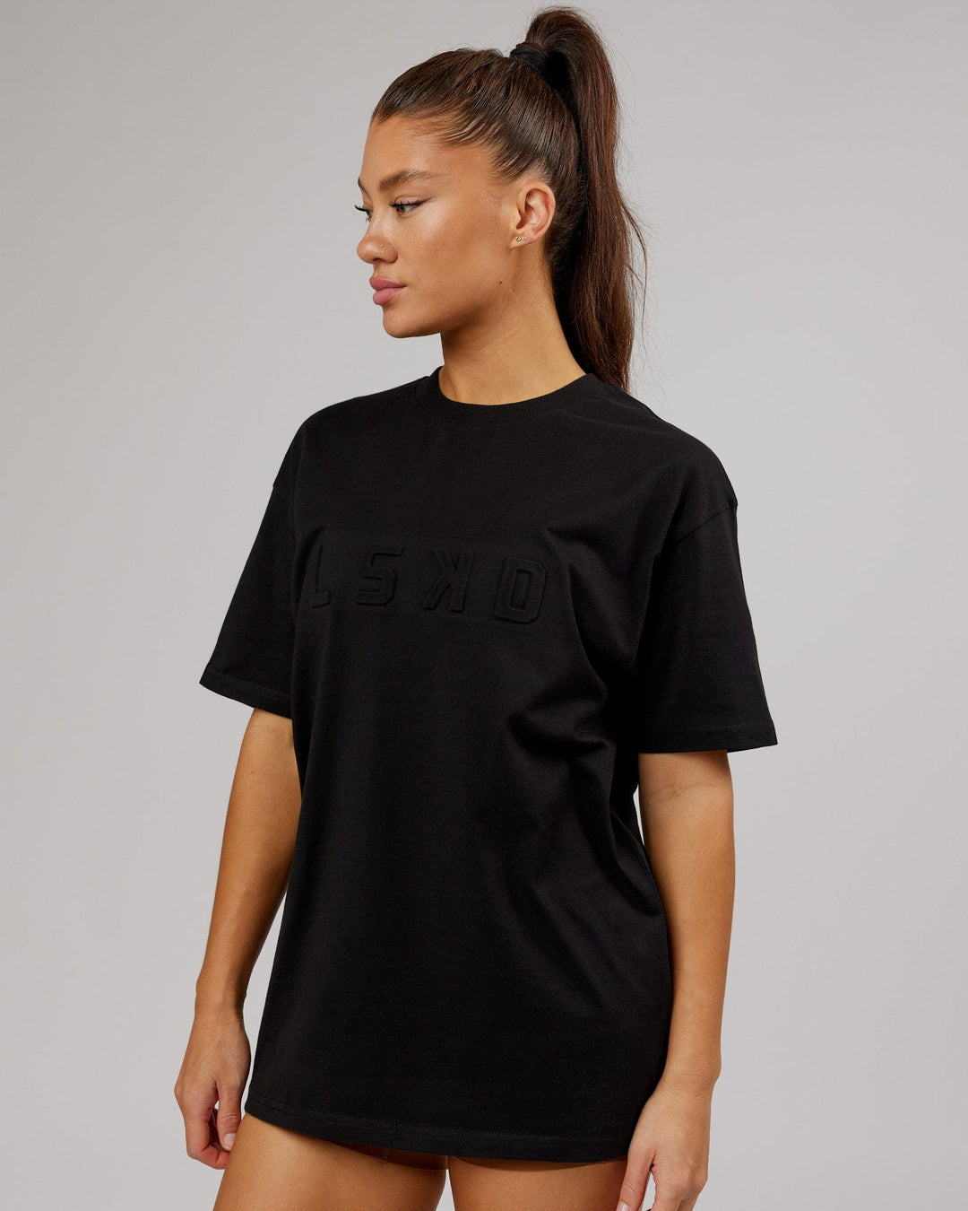 Woman wearing Unisex Stamped 2.0 Heavyweight Tee Oversize - Black - view 6
