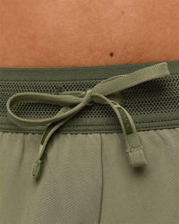 Woman wearing Accelerate 3" Mid-Rise Running Short - Pure Olive-Fog | Model:Xs | Size:ISSY | Thumbnail Index: 8