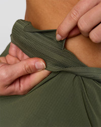 Woman wearing Accelerate 3" Mid-Rise Running Short - Pure Olive-Fog | Model:Xs | Size:ISSY | Thumbnail Index: 16