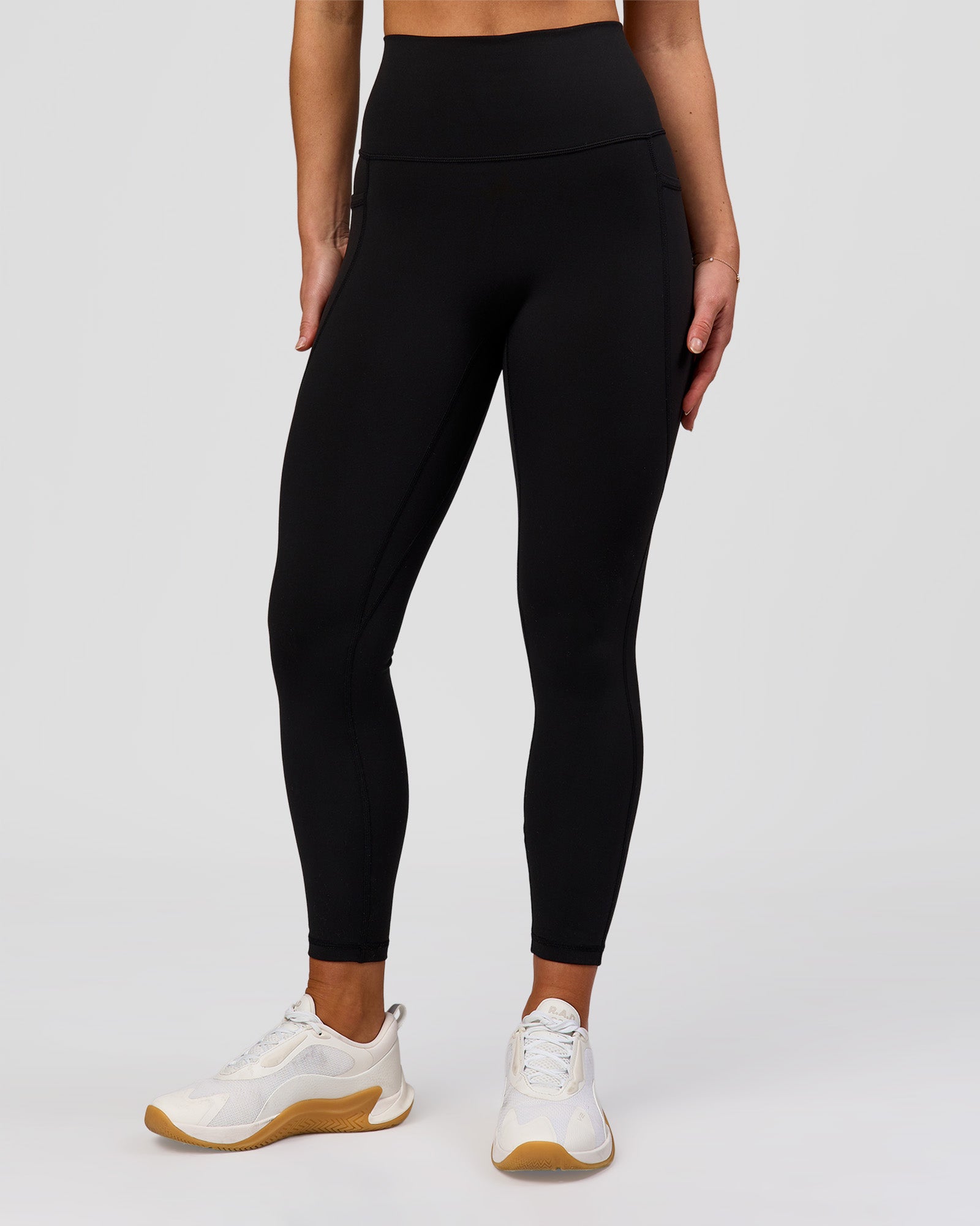 Woman wearing Fusion O.G Ultra High-Rise 7/8 Legging Pockets - Black | Model:Xs | Size:ISSY