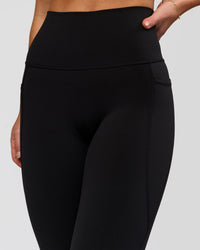 Woman wearing Fusion O.G Ultra High-Rise 7/8 Legging Pockets - Black | Model:Xs | Size:ISSY | Thumbnail Index: 7