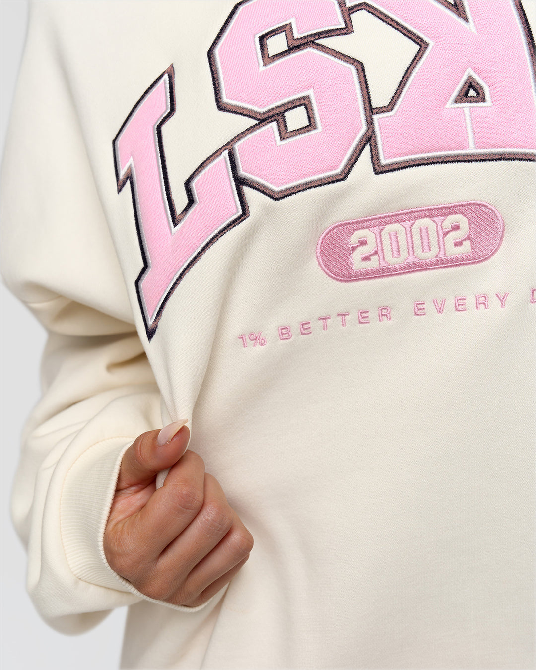 Woman wearing Varsity Boxy Crew - Off White-Pink Rose | Model:Bianca | Size:L - view 11