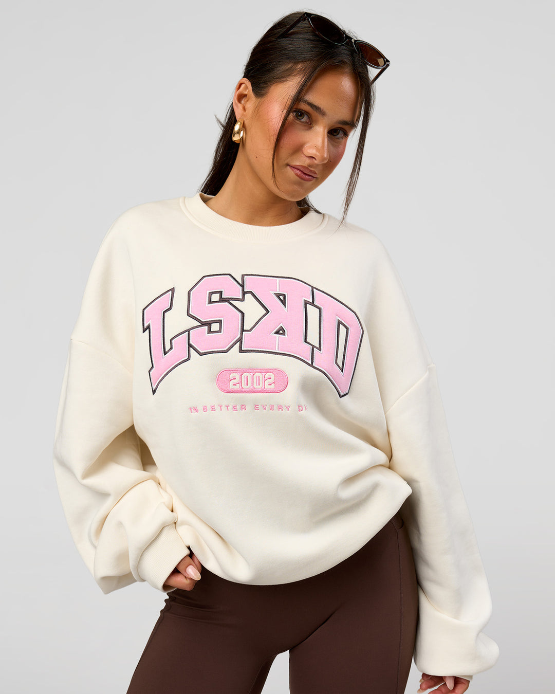 Woman wearing Varsity Boxy Crew - Off White-Pink Rose | Model:Bianca | Size:L - view 2