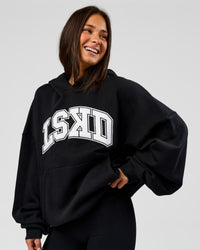 Woman wearing Varsity Boxy Hoodie - Caviar-White | Model:Bianca | Size:L | Thumbnail Index: 4