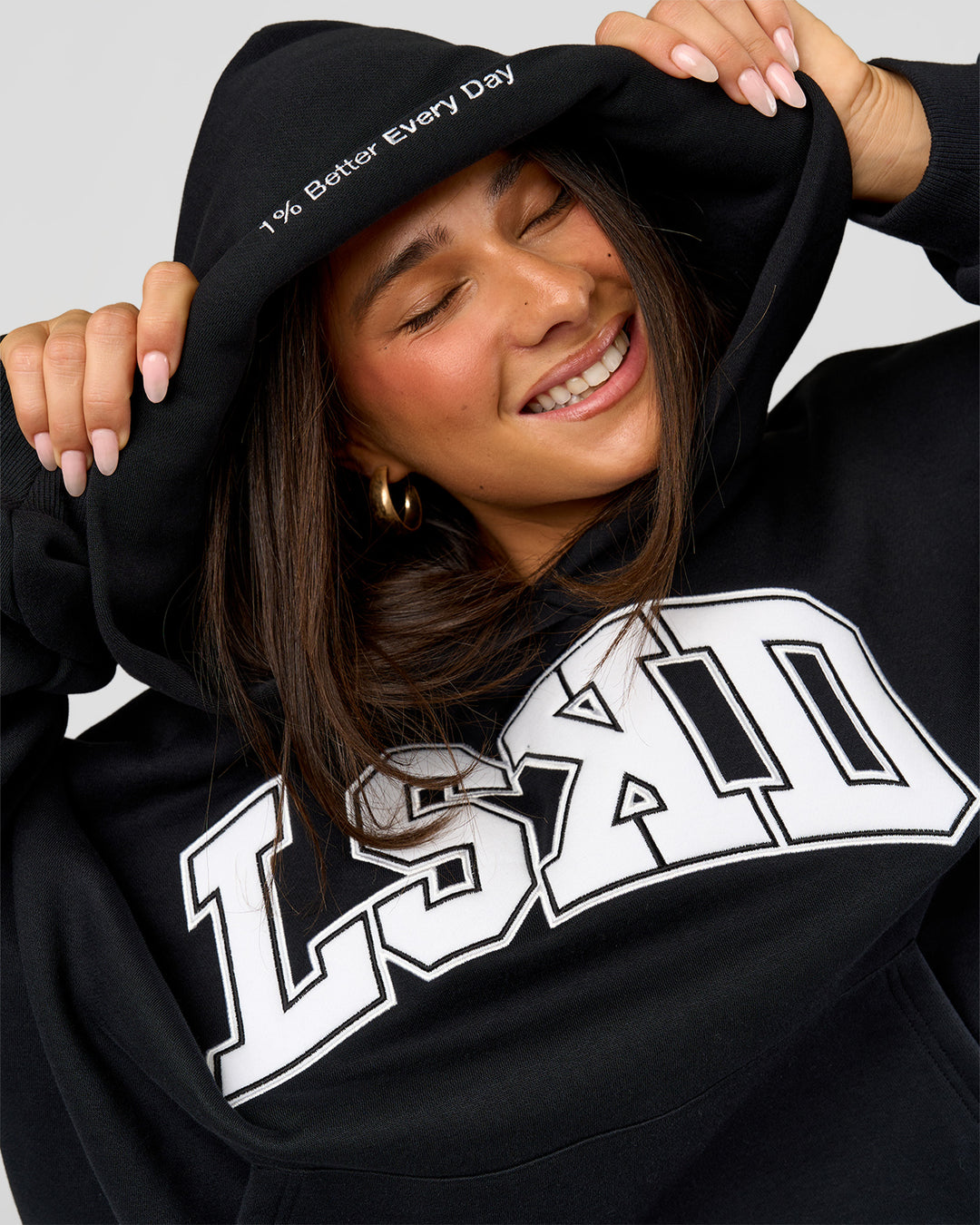 Woman wearing Varsity Boxy Hoodie - Caviar-White | Model:Bianca | Size:L - view 8