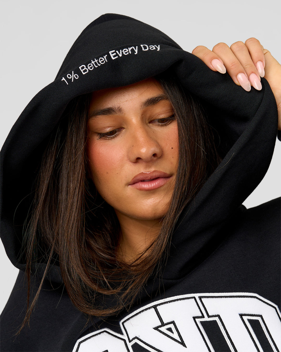 Woman wearing Varsity Boxy Hoodie - Caviar-White | Model:Bianca | Size:L - view 2