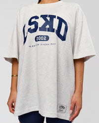 Woman wearing Varsity EST Heavyweight Oversized Tee  - Silver Marl-Future Navy | Model:Bianca | Size:L | Thumbnail Index: 1