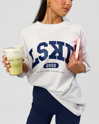 Woman wearing Varsity EST Heavyweight Oversized Tee  - Silver Marl-Future Navy | Model:Bianca | Size:L | Thumbnail Index: 6
