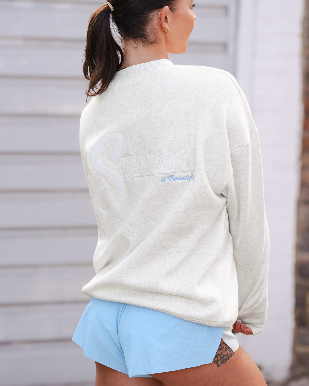 Woman wearing Strong is Beautiful Oversized Sweater - Silver Marl | Model:Charlotte | Size:M - view 7