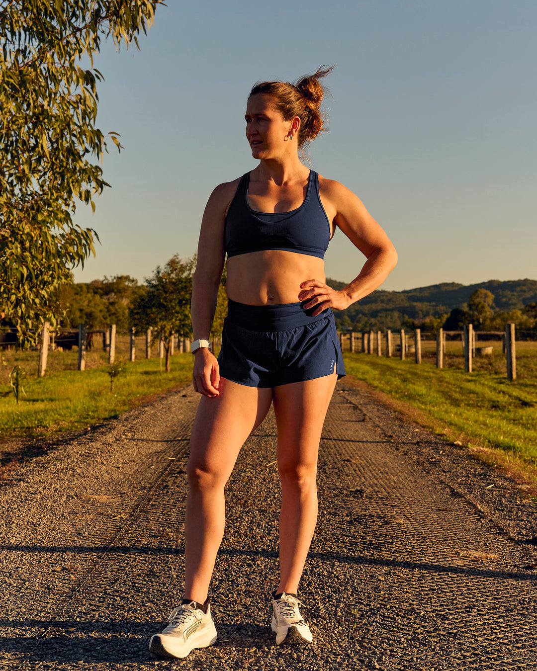 Woman wearing Tia-Clair Toomey-Orr Accelerate 3" Storage Running Short - Future Navy | Model:Tia | Size:M - view 15