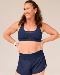 Woman wearing Tia-Clair Toomey-Orr Accelerate 3" Storage Running Short - Future Navy | Model:Tia | Size:M | Thumbnail Index: 17
