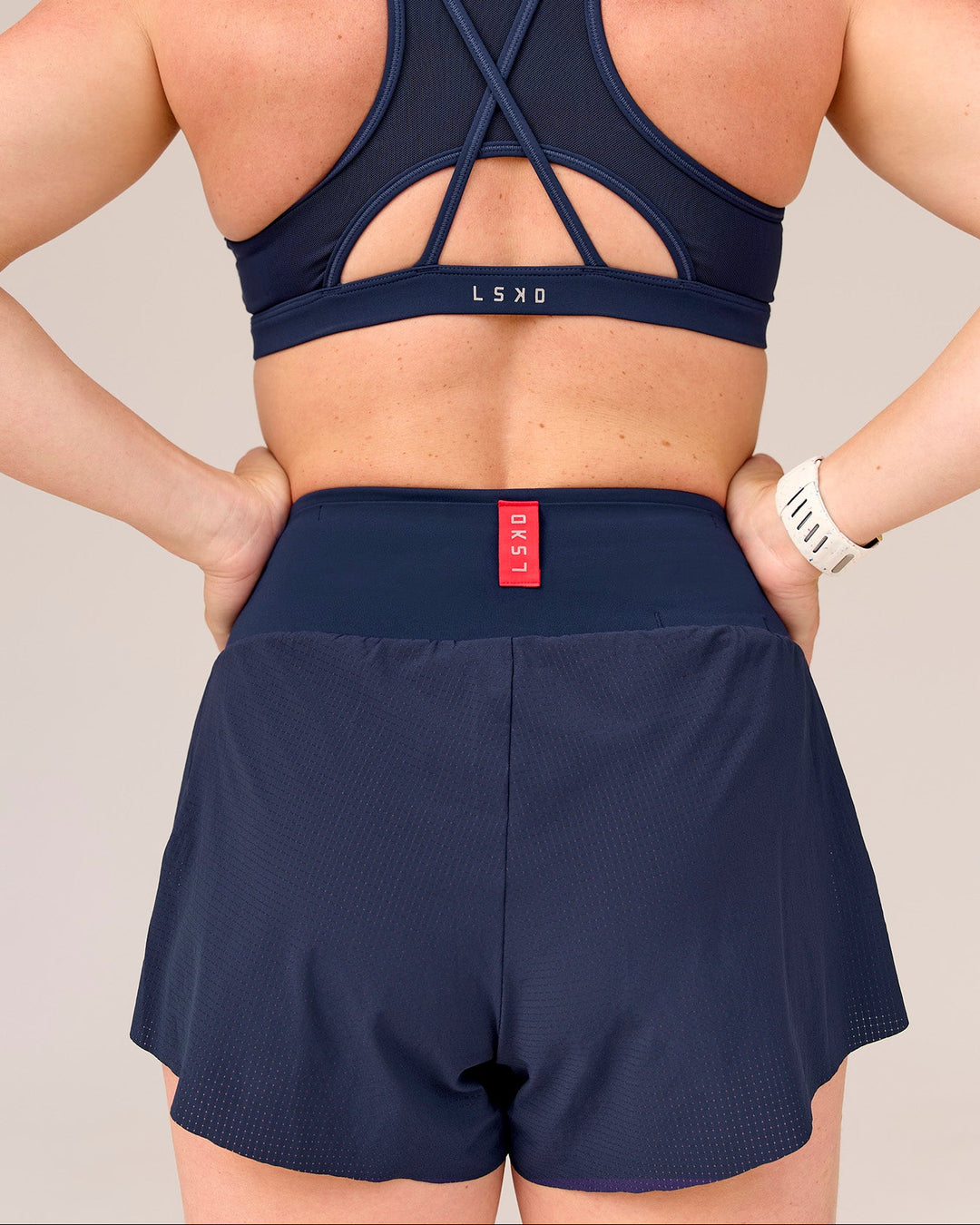 Woman wearing Tia-Clair Toomey-Orr Accelerate 3" Storage Running Short - Future Navy | Model:Tia | Size:M - view 11