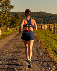 Woman wearing Tia-Clair Toomey-Orr Accelerate 3" Storage Running Short - Future Navy | Model:Tia | Size:M | Thumbnail Index: 16