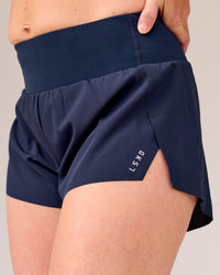 Woman wearing Tia-Clair Toomey-Orr Accelerate 3" Storage Running Short - Future Navy | Model:Tia | Size:M | Thumbnail Index: 13