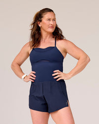 Woman wearing Tia-Clair Toomey-Orr Legacy 3" Run One-Piece - Future Navy | Model:Tia | Size:M | Thumbnail Index: 23