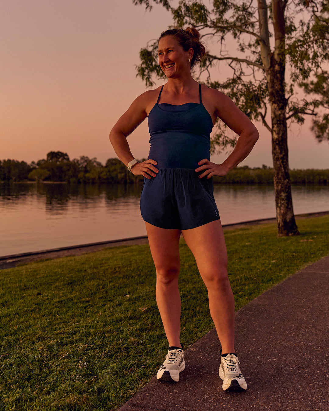 Woman wearing Tia-Clair Toomey-Orr Legacy 3" Run One-Piece - Future Navy | Model:Tia | Size:M - view 3