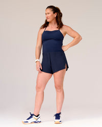 Woman wearing Tia-Clair Toomey-Orr Legacy 3" Run One-Piece - Future Navy | Model:Tia | Size:M | Thumbnail Index: 19