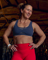 Woman wearing Unstoppable Racerback Sports Bra - Future Navy | Model:Tia | Size:M | Thumbnail Index: 3