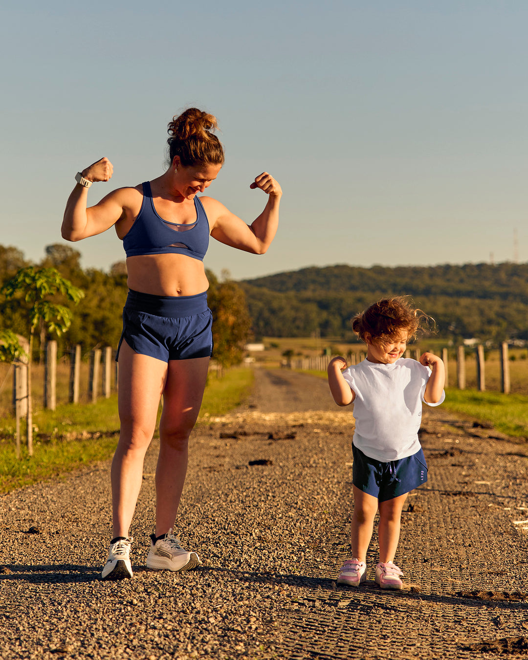 Woman wearing Unstoppable Racerback Sports Bra - Future Navy | Model:Tia | Size:M - view 15