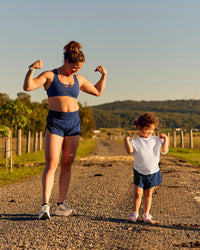 Woman wearing Unstoppable Racerback Sports Bra - Future Navy | Model:Tia | Size:M | Thumbnail Index: 14