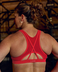 Woman wearing Unstoppable Racerback Sports Bra - Scarlet | Model:Tia | Size:M | Thumbnail Index: 10