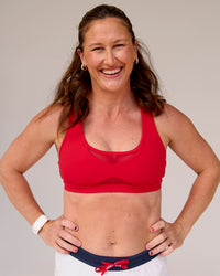 Woman wearing Unstoppable Racerback Sports Bra - Scarlet | Model:Tia | Size:M | Thumbnail Index: 6