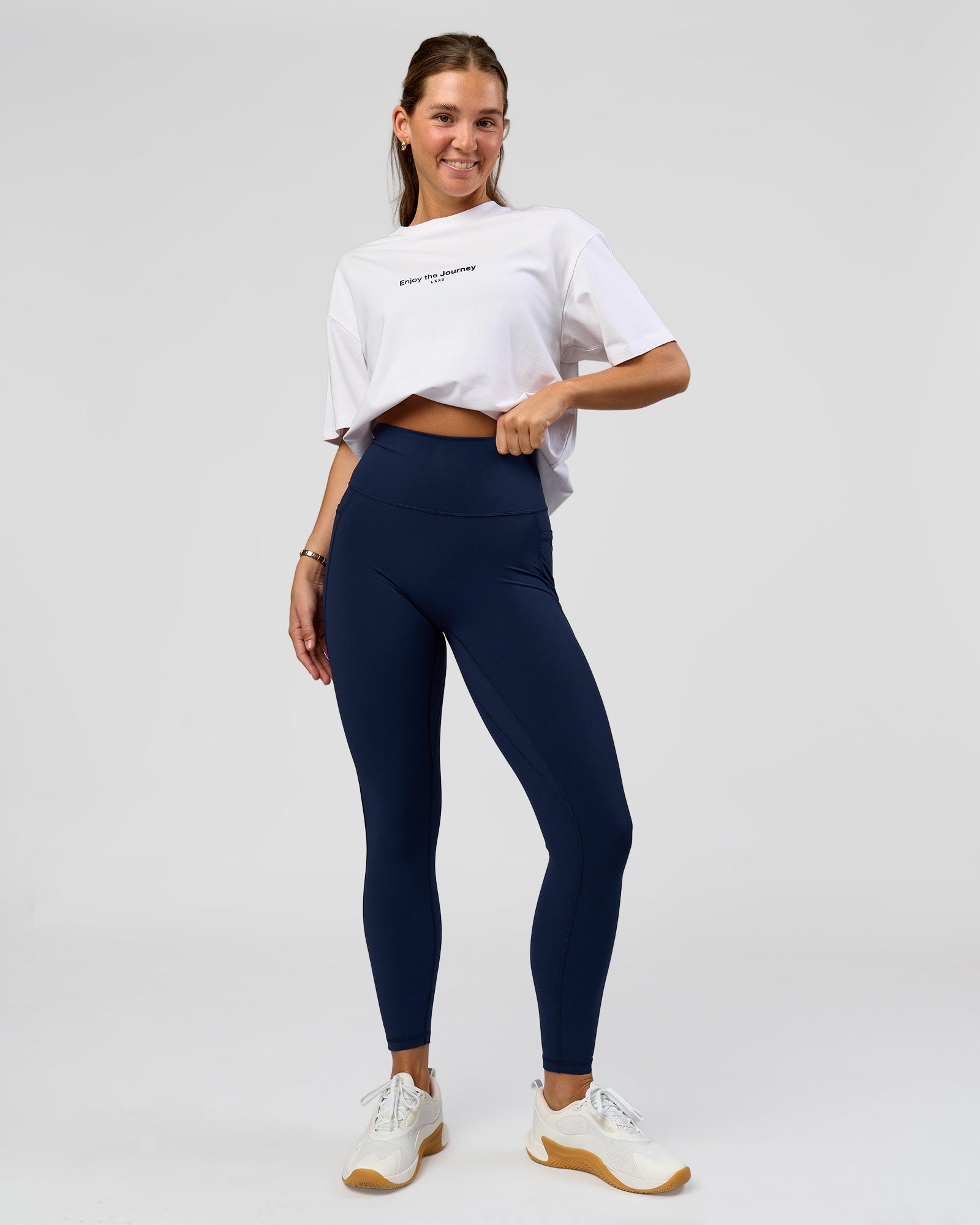 Woman wearing O.G. Fusion Ultra High-Rise Full Length Legging Pockets - Future Navy | Model:Amity| Size:S
