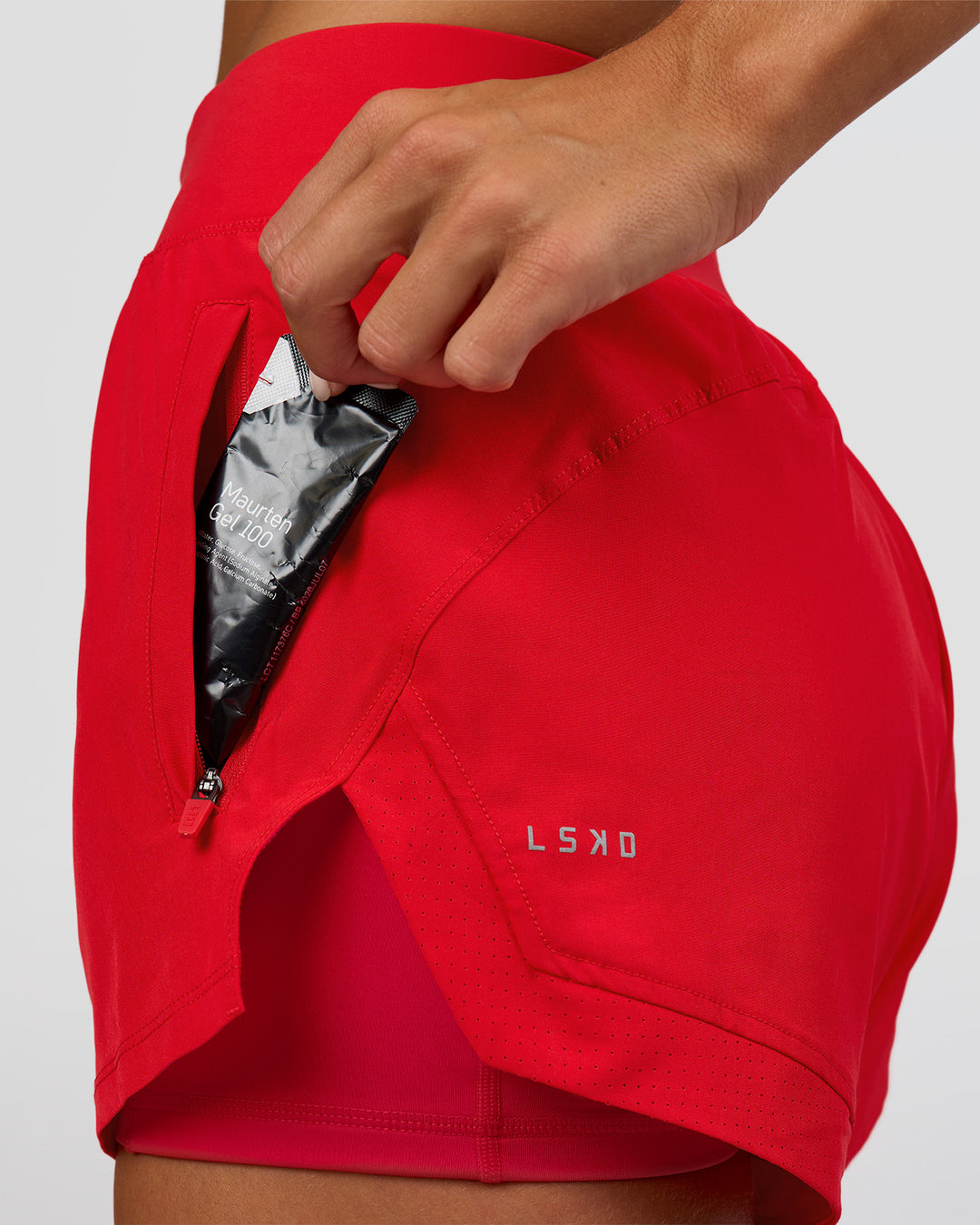 Woman wearing Challenger 3" Lined Performance Short - Scarlet | Model:Amity | Size:S - view 3