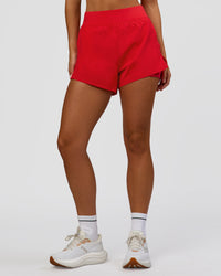 Woman wearing Challenger 3" Lined Performance Short - Scarlet | Model:Amity | Size:S | Thumbnail Index: 3