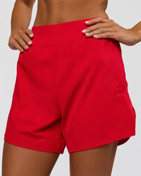 Woman wearing Challenger 5" Lined Performance Short - Scarlet | Model:Amity | Size:S | Thumbnail Index: 0