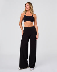 Woman wearing Elixir High-Rise Pant - Black | Model:Amity | Size:S | Thumbnail Index: 1