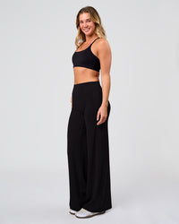 Woman wearing Elixir High-Rise Pant - Black | Model:Amity | Size:S | Thumbnail Index: 5
