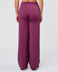 Woman wearing Elixir High-Rise Pant - Boysenberry | Model:Amity | Size:S | Thumbnail Index: 2