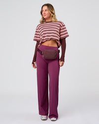 Woman wearing Elixir High-Rise Pant - Boysenberry | Model:Amity | Size:S | Thumbnail Index: 4