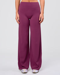 Woman wearing Elixir High-Rise Pant - Boysenberry | Model:Amity | Size:S | Thumbnail Index: 5