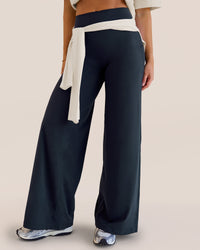 Woman wearing Elixir High-Rise Pant - Midnight Navy | Model:Amity | Size:S | Thumbnail Index: 2