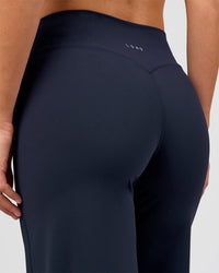 Woman wearing Elixir High-Rise Pant - Midnight Navy | Model:Amity | Size:S | Thumbnail Index: 4