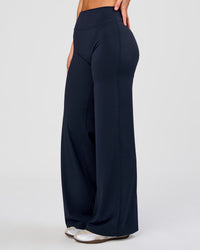 Woman wearing Elixir High-Rise Pant - Midnight Navy | Model:Amity | Size:S | Thumbnail Index: 0