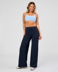 Woman wearing Elixir High-Rise Pant - Midnight Navy | Model:Amity | Size:S | Thumbnail Index: 5