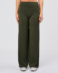 Woman wearing Elixir High-Rise Pant - Pure Olive | Model:Amity | Size:S | Thumbnail Index: 0