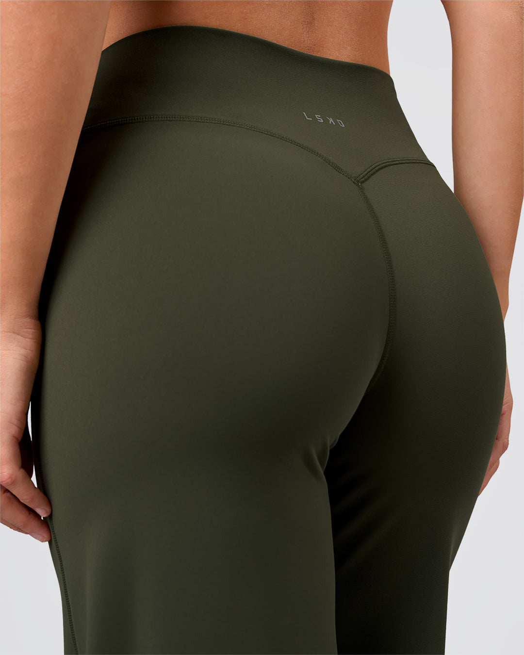 Woman wearing Elixir High-Rise Pant - Pure Olive | Model:Amity | Size:S - view 4