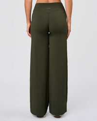Woman wearing Elixir High-Rise Pant - Pure Olive | Model:Amity | Size:S | Thumbnail Index: 4