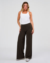 Woman wearing Elixir High-Rise Pant - Ground Coffee | Model:Amity | Size:S | Thumbnail Index: 6