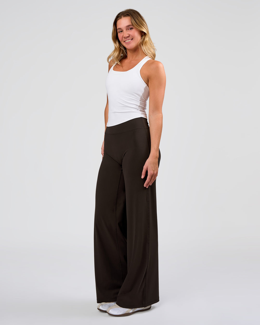 Woman wearing Elixir High-Rise Pant - Ground Coffee | Model:Amity | Size:S - view 9