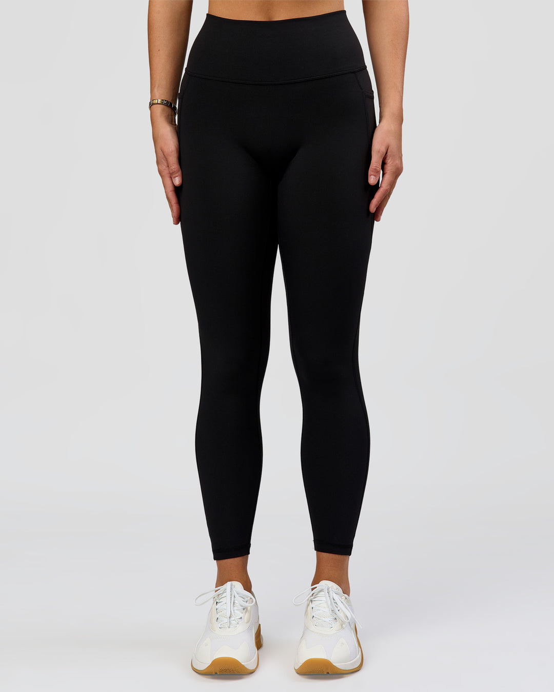 Woman wearing O.G. Fusion High-Rise Full Length Legging Pockets - Black | Model:Amity | Size:S - view 2