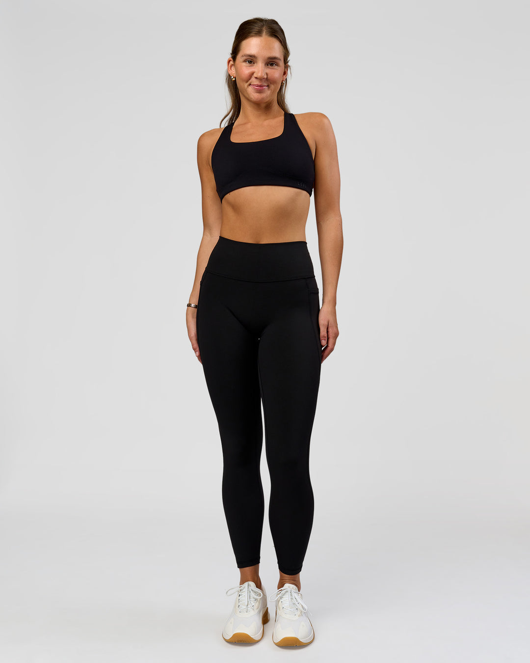 Woman wearing O.G. Fusion High-Rise Full Length Legging Pockets - Black | Model:Amity | Size:S - view 5