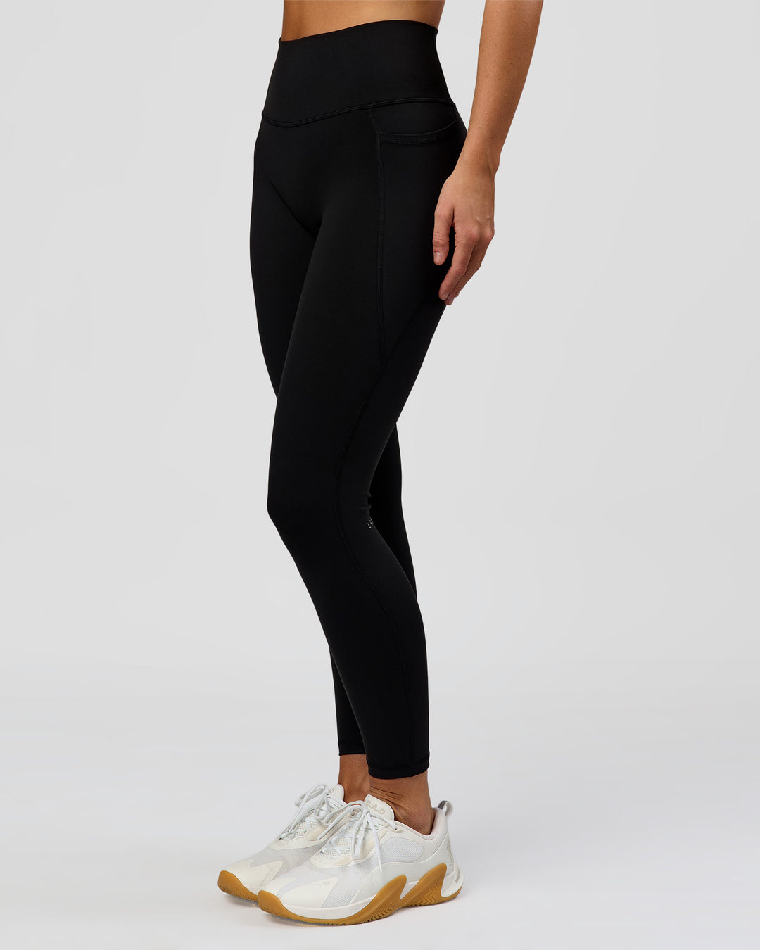 Woman wearing O.G. Fusion High-Rise Full Length Legging Pockets - Black | Model:Amity | Size:S - view 7