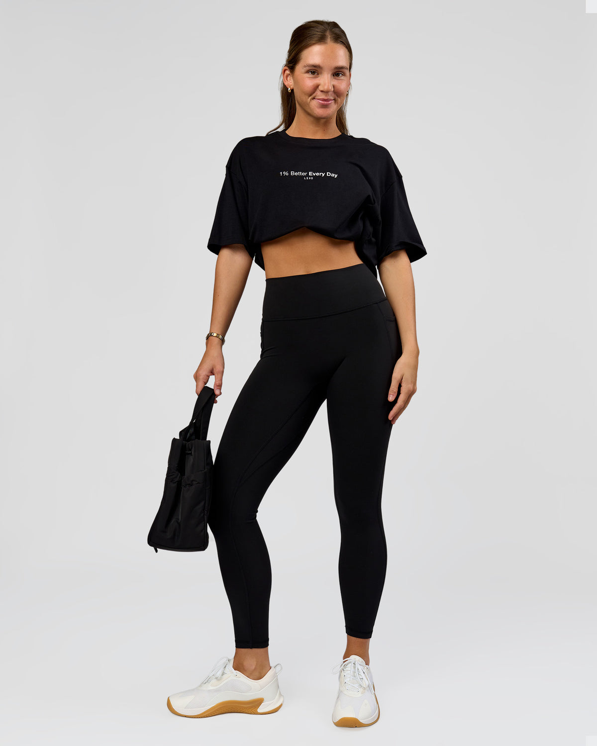 Woman wearing O.G. Fusion High-Rise Full Length Legging Pockets - Black | Model:Amity | Size:S